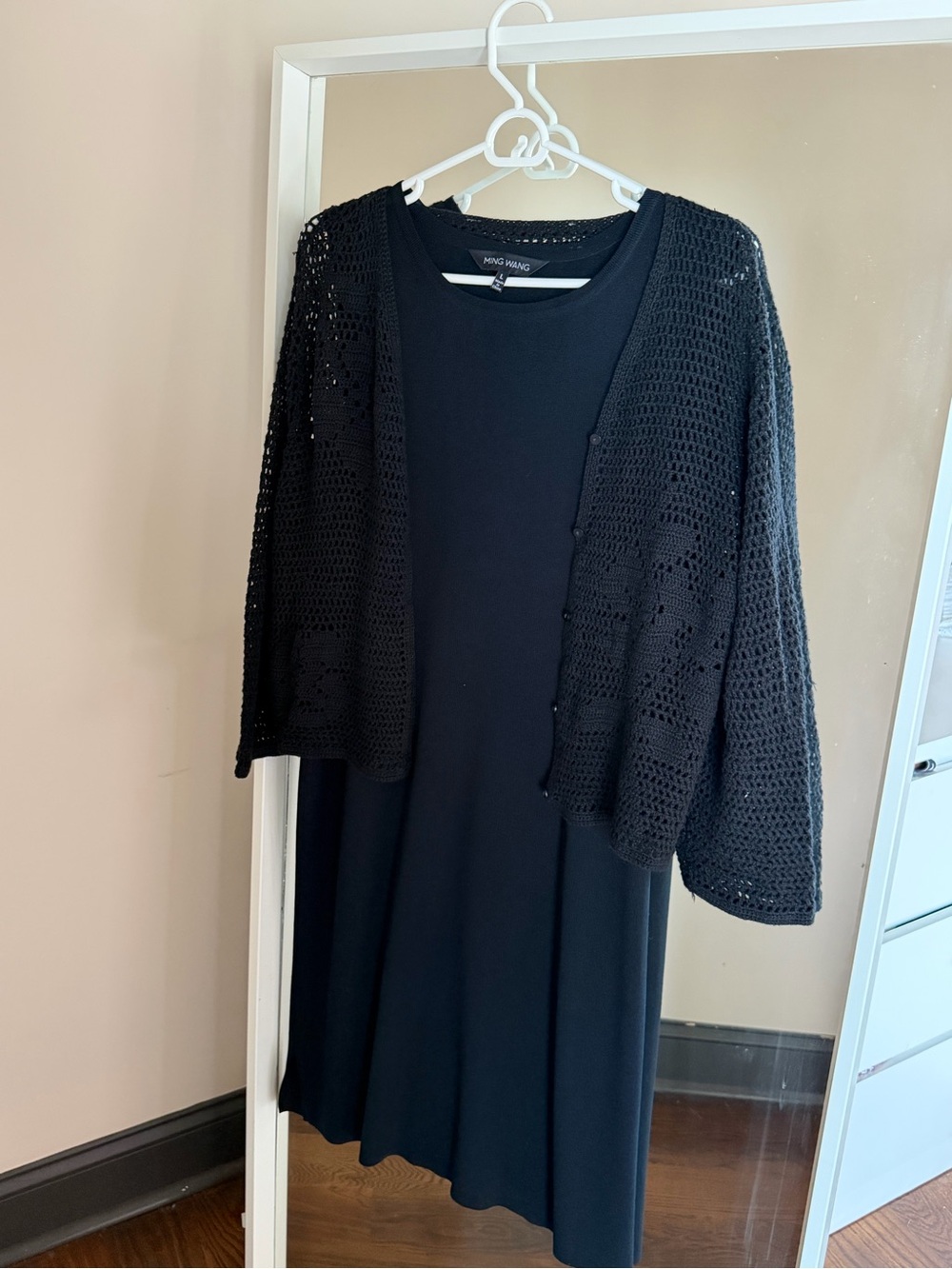 Black dress with cardigan.